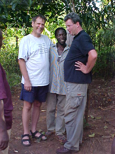 Don Croft and Georg Ritschl with a friend of Dr. Kayiwa in Uganda 2003