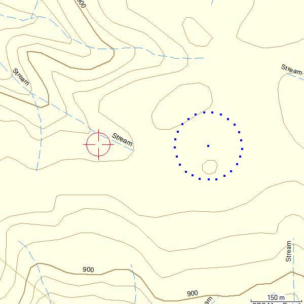 Topographic map showing contour lines, streams, elevation markers (900), and two circular symbols - one with crosshairs, one dotted.